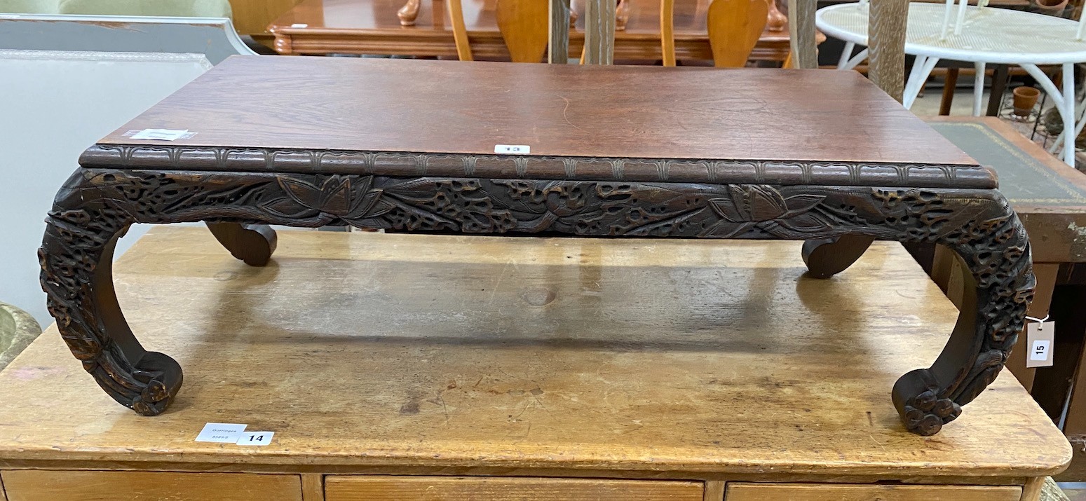 A Malaysian carved hardwood low table, width 92cm, depth 40cm, height 29cm